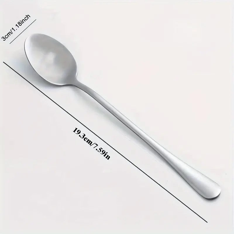 Metal tea spoon with saying