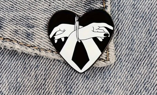 Heart shaped pin with tied wrists