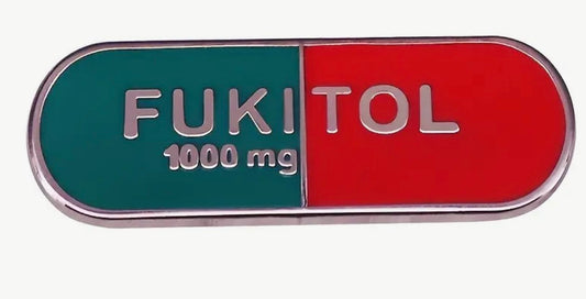 Fukitol enamel pin