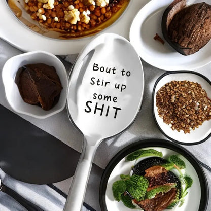 Metal tea spoon with saying